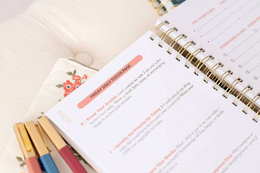 Kind Birdie Faith-based Christian planner with daily focus page and stationery items on a light background