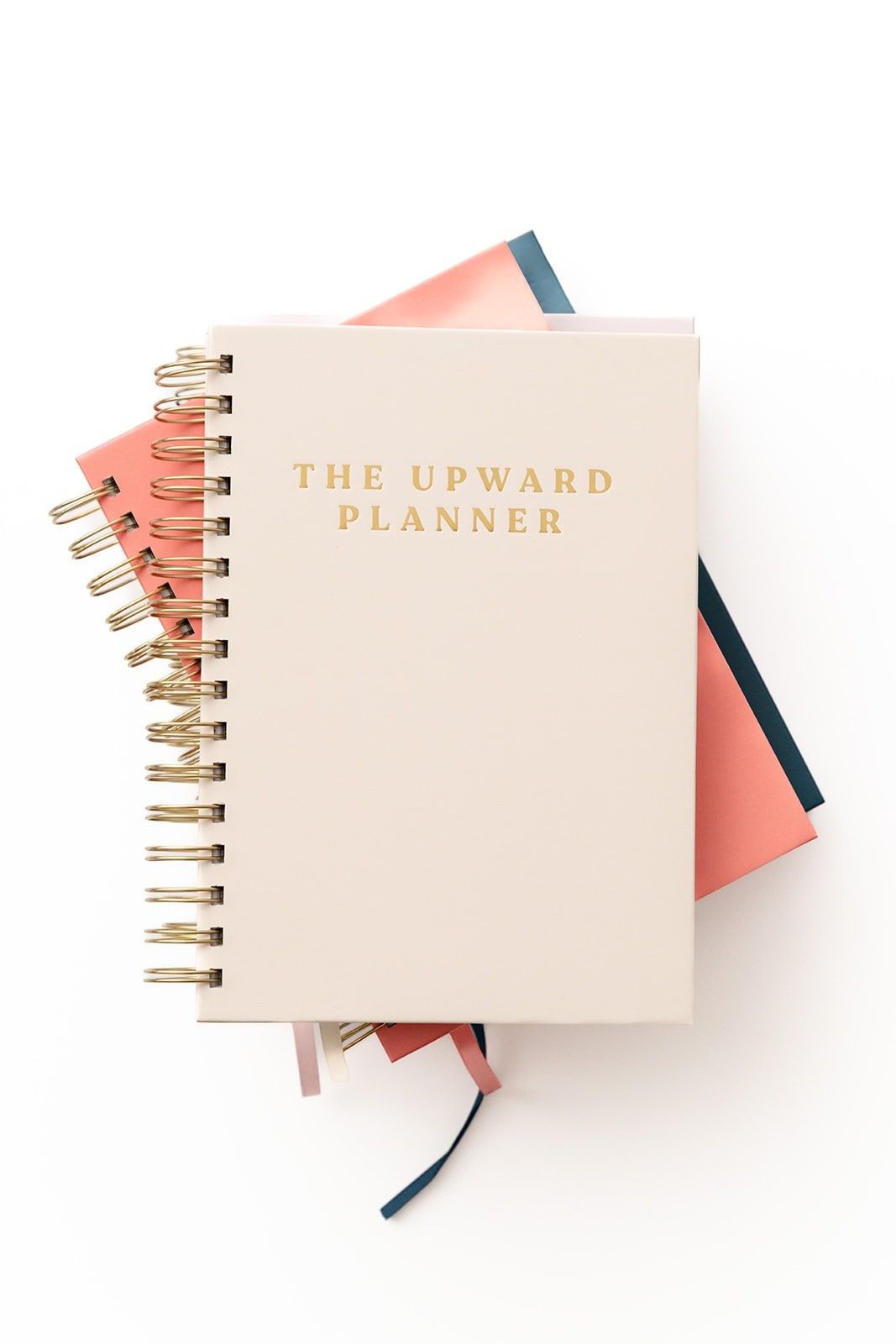 Kind Birdie Upward Planner, a 90-day Christian planner in cream with gold foil text and gold spiral binding. Features ribbon bookmarks.